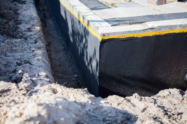 Professional Waterproofing technician working in Bluffton, SC